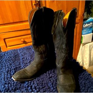 Black suede cowboy boots.